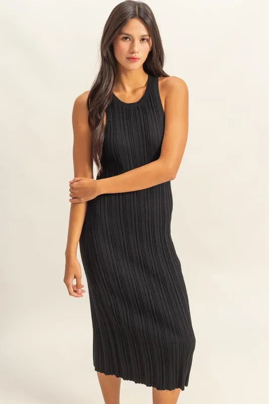 The round neck offers a classic and flattering neckline. The black color bodycon silhouette hugs your figure in all the right places for a sexy and confident look. The ribbed knit fabric adds texture and dimension to the dress.