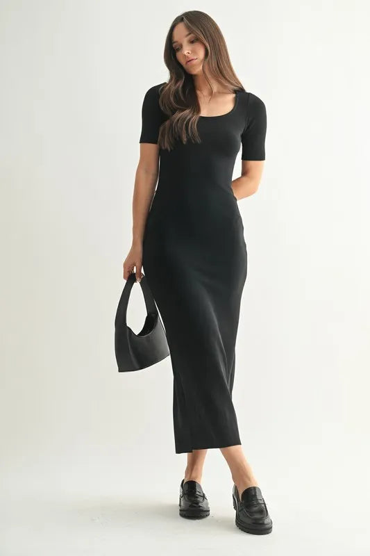 The Laguna Soft Drape Maxi Dress is an elegant and versatile piece that combines a flowing silhouette with a soft and comfortable fabric. The soft drape of the black dress creates a flattering and feminine look that is perfect for various occasions. The maxi length adds a touch of sophistication.