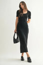 The Laguna Soft Drape Maxi Dress is an elegant and versatile piece that combines a flowing silhouette with a soft and comfortable fabric. The soft drape of the black dress creates a flattering and feminine look that is perfect for various occasions. The maxi length adds a touch of sophistication.