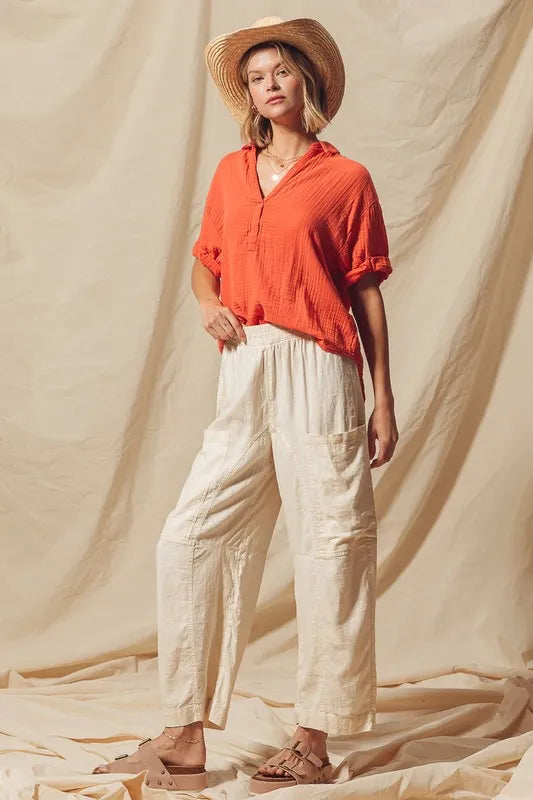 Made from a blend of cotton and linen, these natural color pants offer a breathable and textured fabric that is perfect for casual wear. The slouchy fit and wide legs provide a relaxed and trendy look.