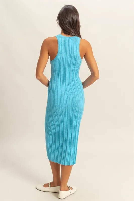 The round neck offers a classic and flattering neckline. The bodycon silhouette hugs your figure in all the right places for a sexy and confident look. The ribbed knit aquamarine color fabric adds texture and dimension.