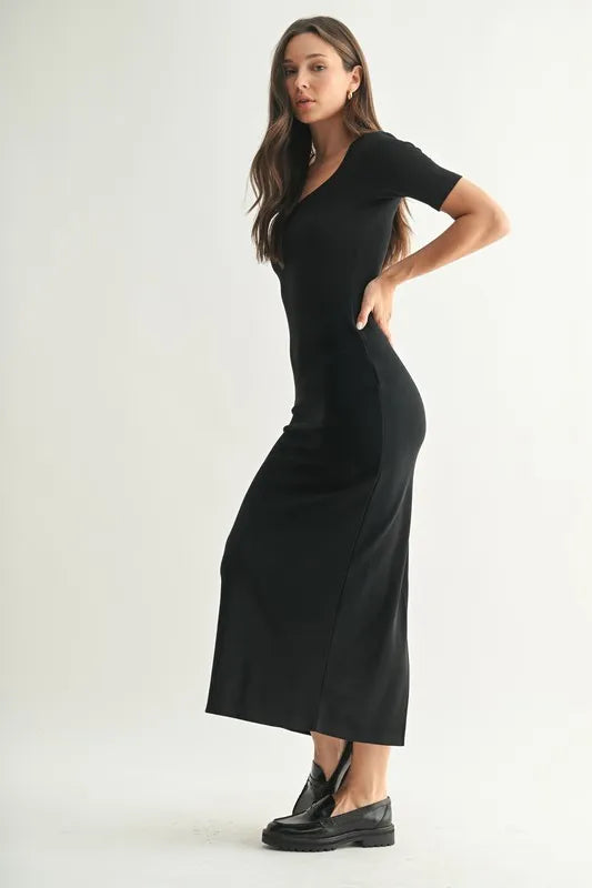 The Laguna Soft Drape Maxi Dress is an elegant and versatile piece that combines a flowing silhouette with a soft and comfortable fabric. The soft drape of the black dress creates a flattering and feminine look that is perfect for various occasions. The maxi length adds a touch of sophistication.