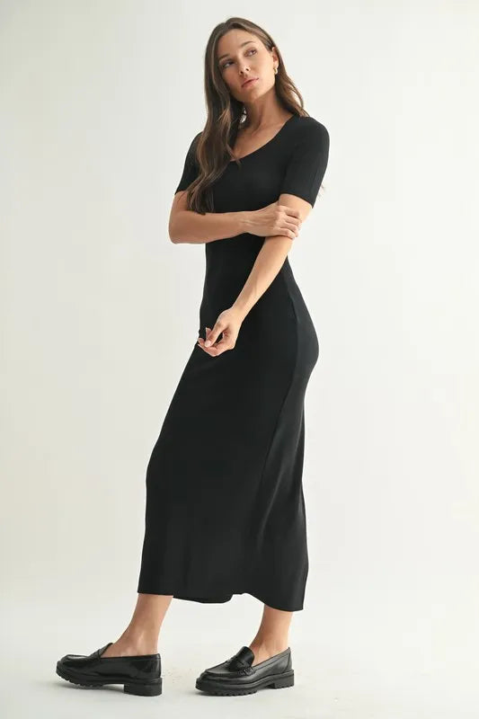 The Laguna Soft Drape Maxi Dress is an elegant and versatile piece that combines a flowing silhouette with a soft and comfortable fabric. The soft drape of the black dress creates a flattering and feminine look that is perfect for various occasions. The maxi length adds a touch of sophistication.