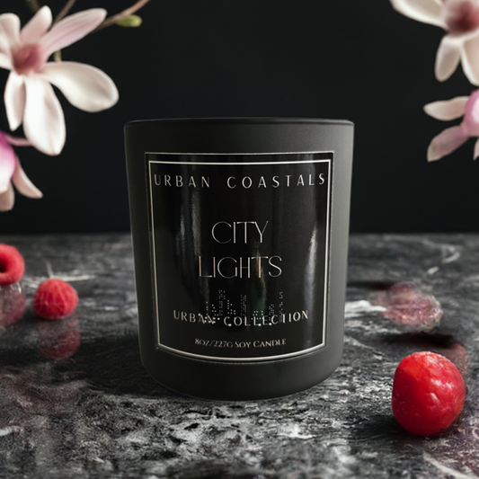 berry and vanilla scented 8oz candle in a black matte jar.