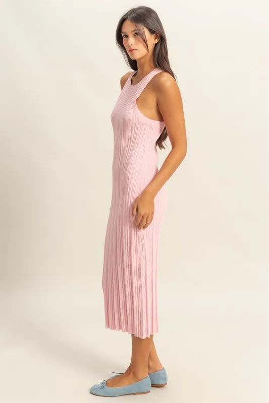 The round neck offers a classic and flattering neckline. The pink bodycon silhouette hugs your figure in all the right places.