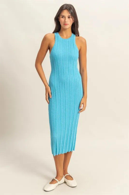 The round neck offers a classic and flattering neckline. The bodycon silhouette hugs your figure in all the right places for a sexy and confident look. The ribbed knit aquamarine color fabric adds texture and dimension.