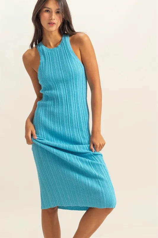 The round neck offers a classic and flattering neckline. The bodycon silhouette hugs your figure in all the right places for a sexy and confident look. The ribbed knit aquamarine color fabric adds texture and dimension.