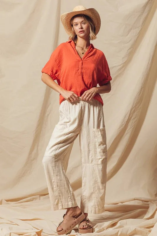 Made from a blend of cotton and linen, these natural color pants offer a breathable and textured fabric that is perfect for casual wear. The slouchy fit and wide legs provide a relaxed and trendy look.